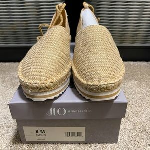 Soft sole, beige and gold flats with ankle straps. Brand new, in box.